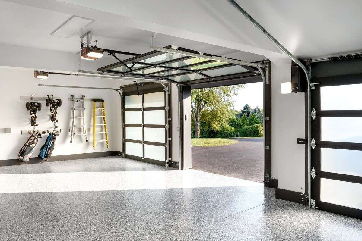 A large garage space with an epoxy resin garage flooring installation.