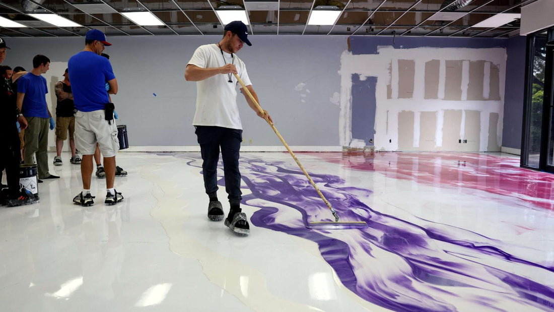 An epoxy floor coating applied in a commercial space with a metallic design.