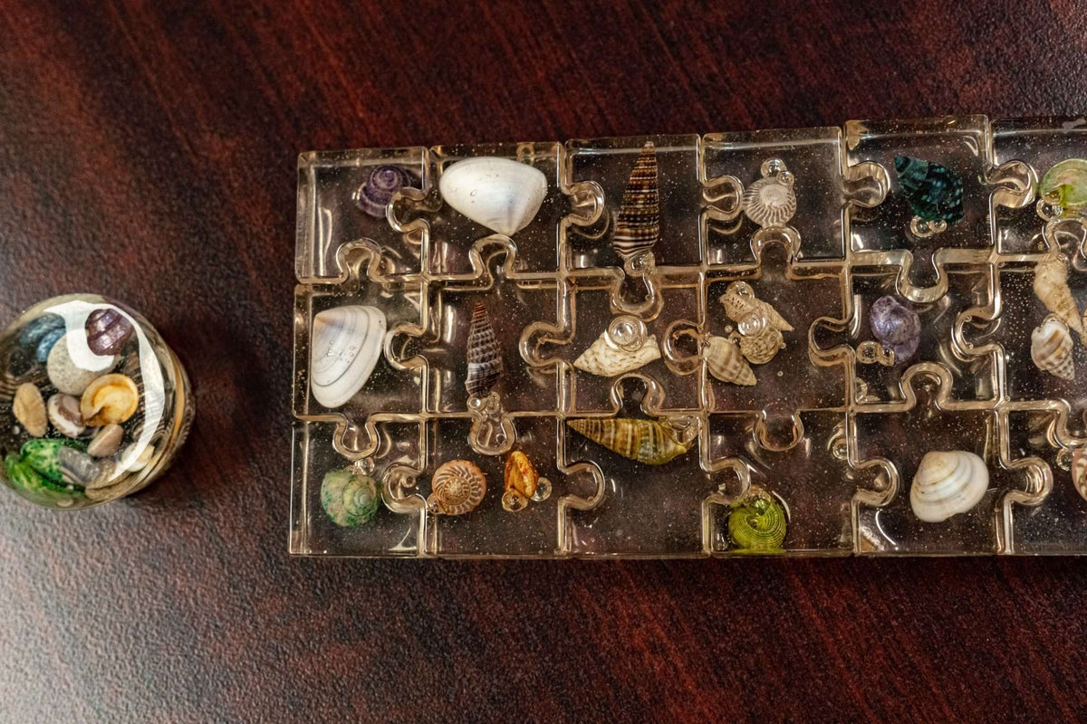 DIY Epoxy resin molds in the shape of puzzle pieces.