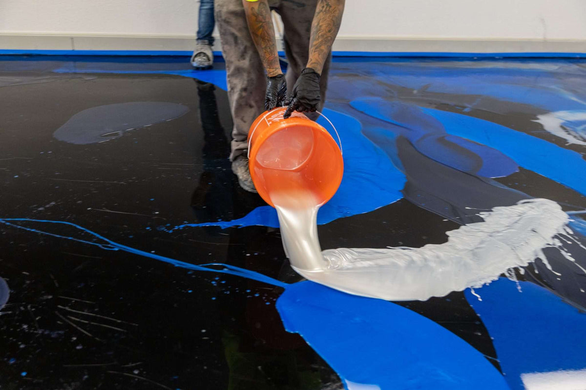An epoxy resin flooring business installing a metallic design epoxy resin floor.