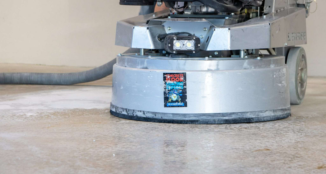 A concrete grinder with professional-grade diamond tools installed.