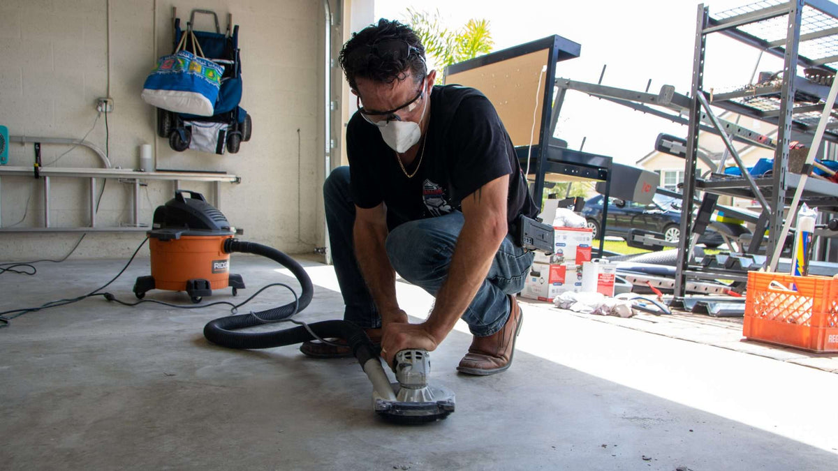 An epoxy resin contractor wearing personal protective gear for epoxy resin safety.