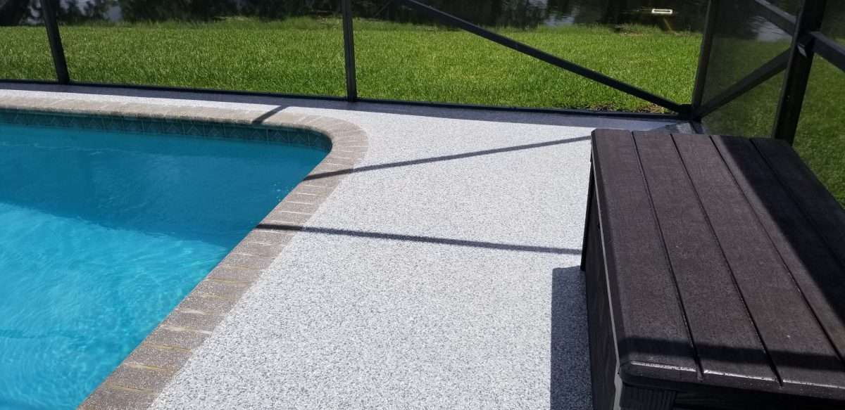 An image showing an epoxy pool deck floor with installed traction additives.