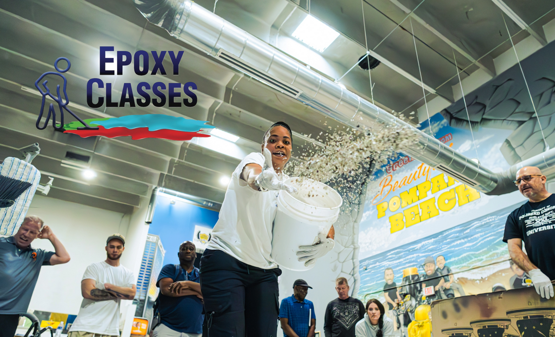 An epoxy resin contractor in a warehouse epoxy flooring class broadcasting flake.