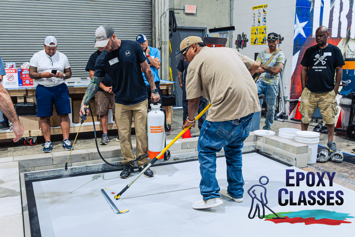 EpoxyClasses' warehouse with contractors learning the installation process.